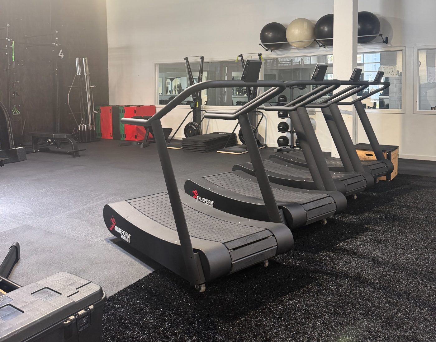 Non-motorized curved treadmills